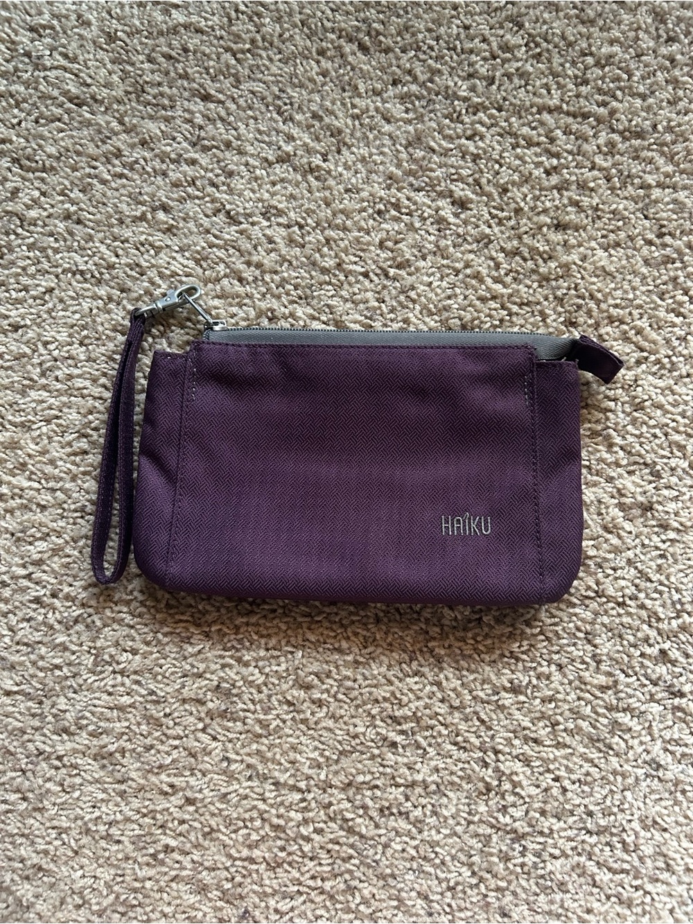 Haiku Stride Wristlet- Blackberry